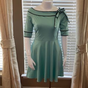 Women’s teal and black vintage boat neck dress
